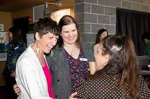 Three women enjoy the Renegade Motherhood Community