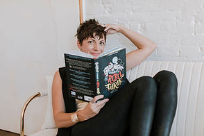 Renegade Motherhood's Founder, Jen Morris, reads a book