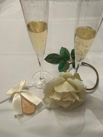 Harry Potter themed fondant cake with handcrafted wand, scarf, and sorting hat decorations — a magical design for fans of the wizarding world.