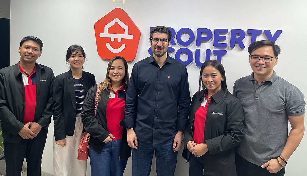 Asian Partner. Johndorf ARES delegates with Property Scout CEO Mario Peng (center right).