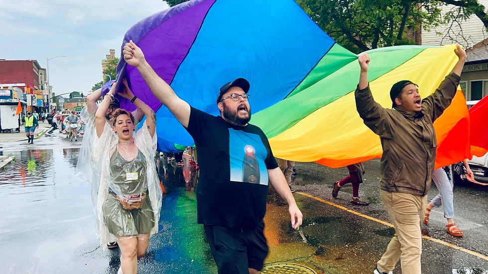 People march in the 5th annual Providence DTPOC Pride March on Friday, June 14, 2024