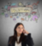 portrait-young-woman-standing-against-wall.jpg