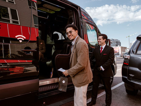 Kendyl Spriggs stepping into a luxury sprinter van