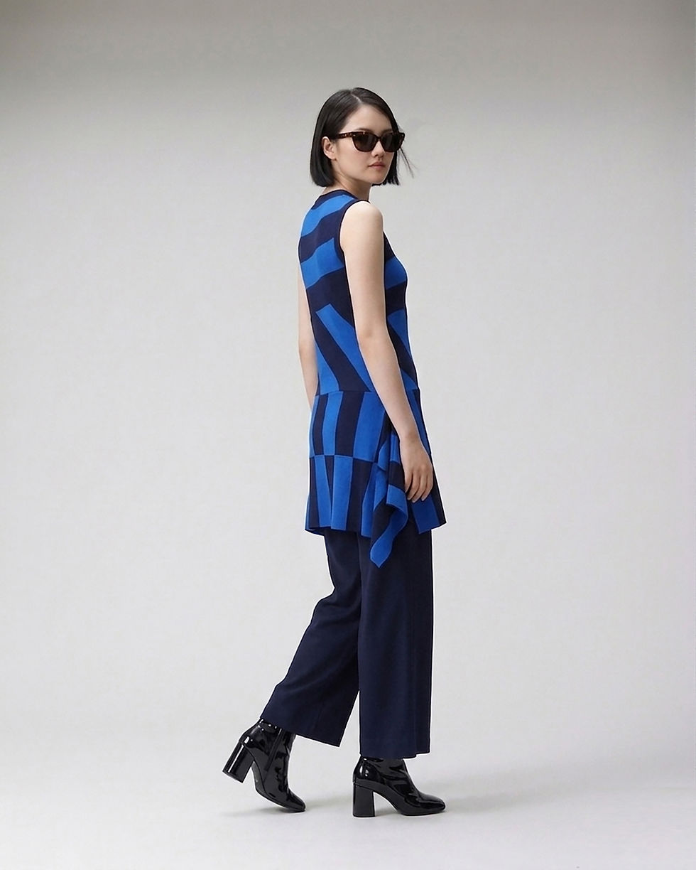 Thumbnail: wearing over wide-leg trousers