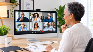 Recruiter conducting an AI video interview with multiple candidates on a desktop video conferencing platform