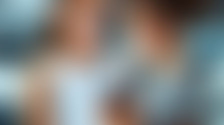 teenagers in gym looking at phone