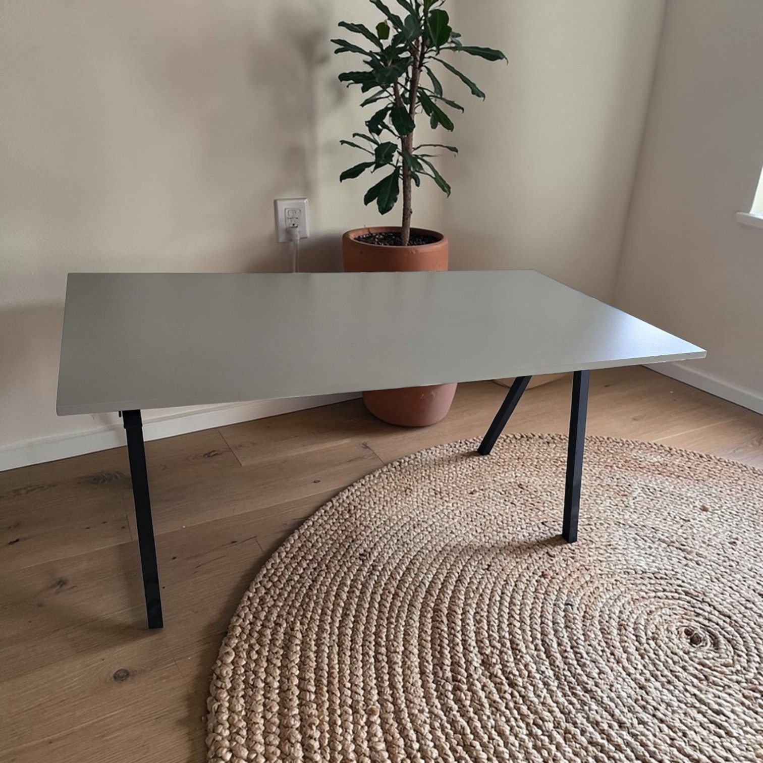 IKEA TROTTEN Desk With A Beige Top And Anthracite A-frame Legs
