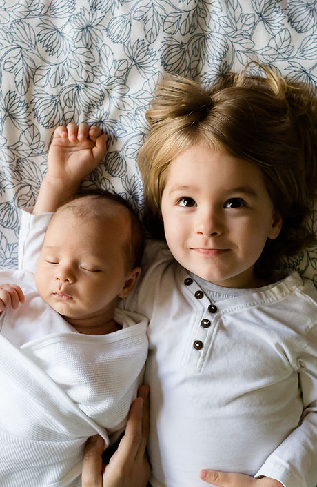 A Toddler and a Baby