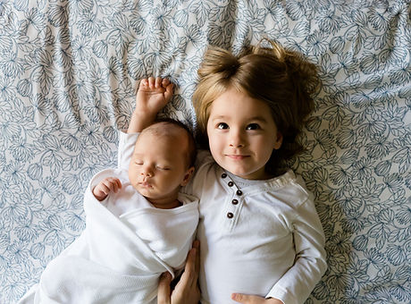 A Toddler and a Baby