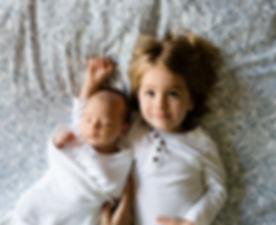 A Toddler and a Baby