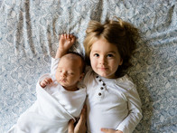 A Toddler and a Baby