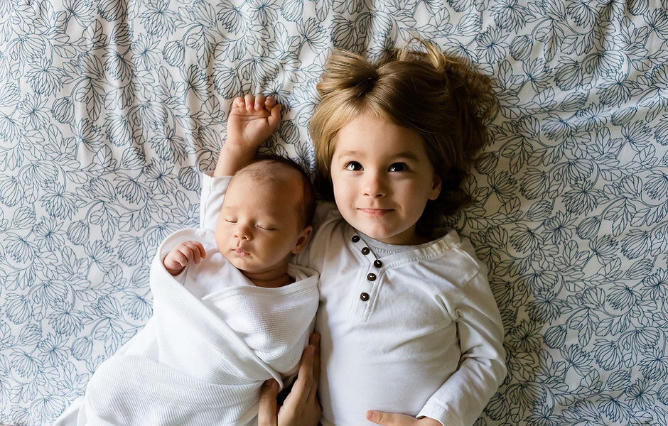 A Toddler and a Baby