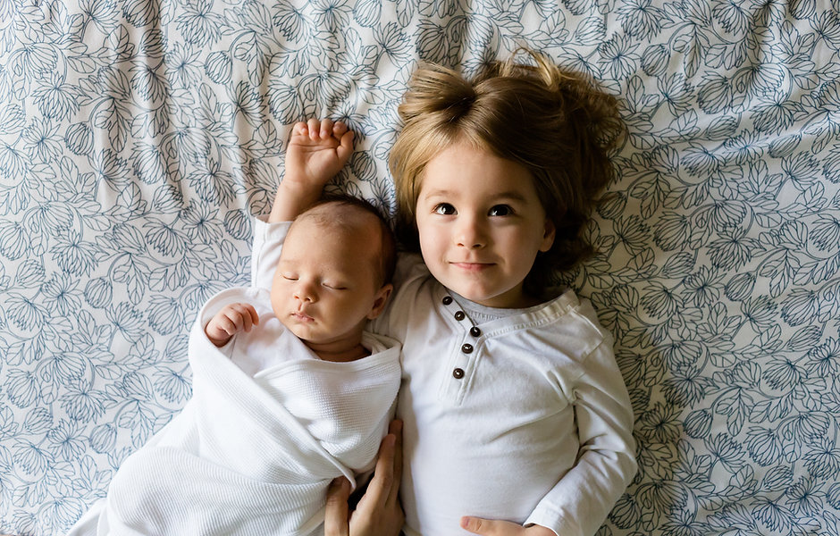 A Toddler and a Baby