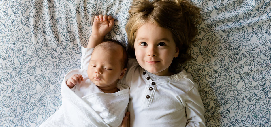 A Toddler and a Baby