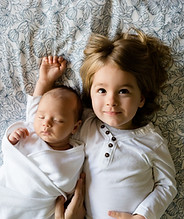 A Toddler and a Baby