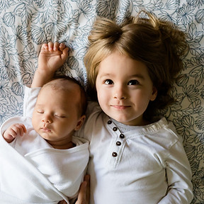 A Toddler and a Baby