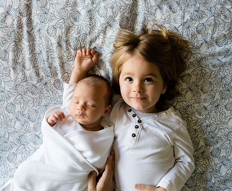 A Toddler and a Baby