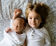 A Toddler and a Baby