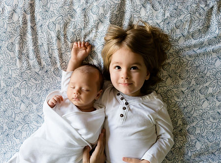 A Toddler and a Baby