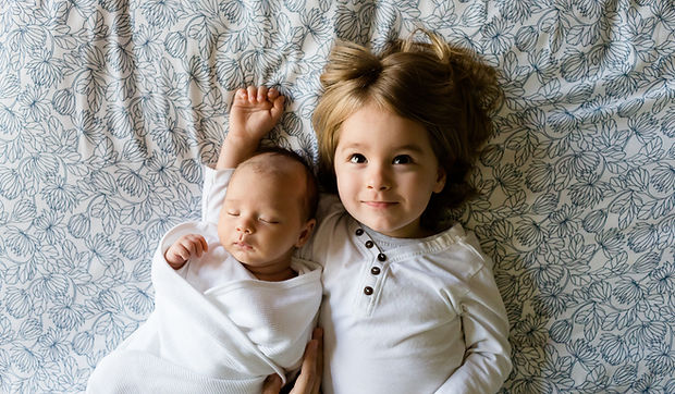 A Toddler and a Baby