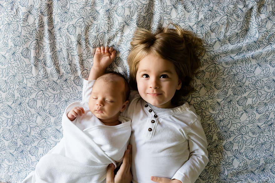 A Toddler and a Baby