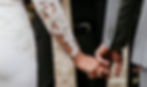 A photo of bride and groom's hands.