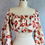 Thumbnail: Swift Kelce Off Shoulder Cropped Top