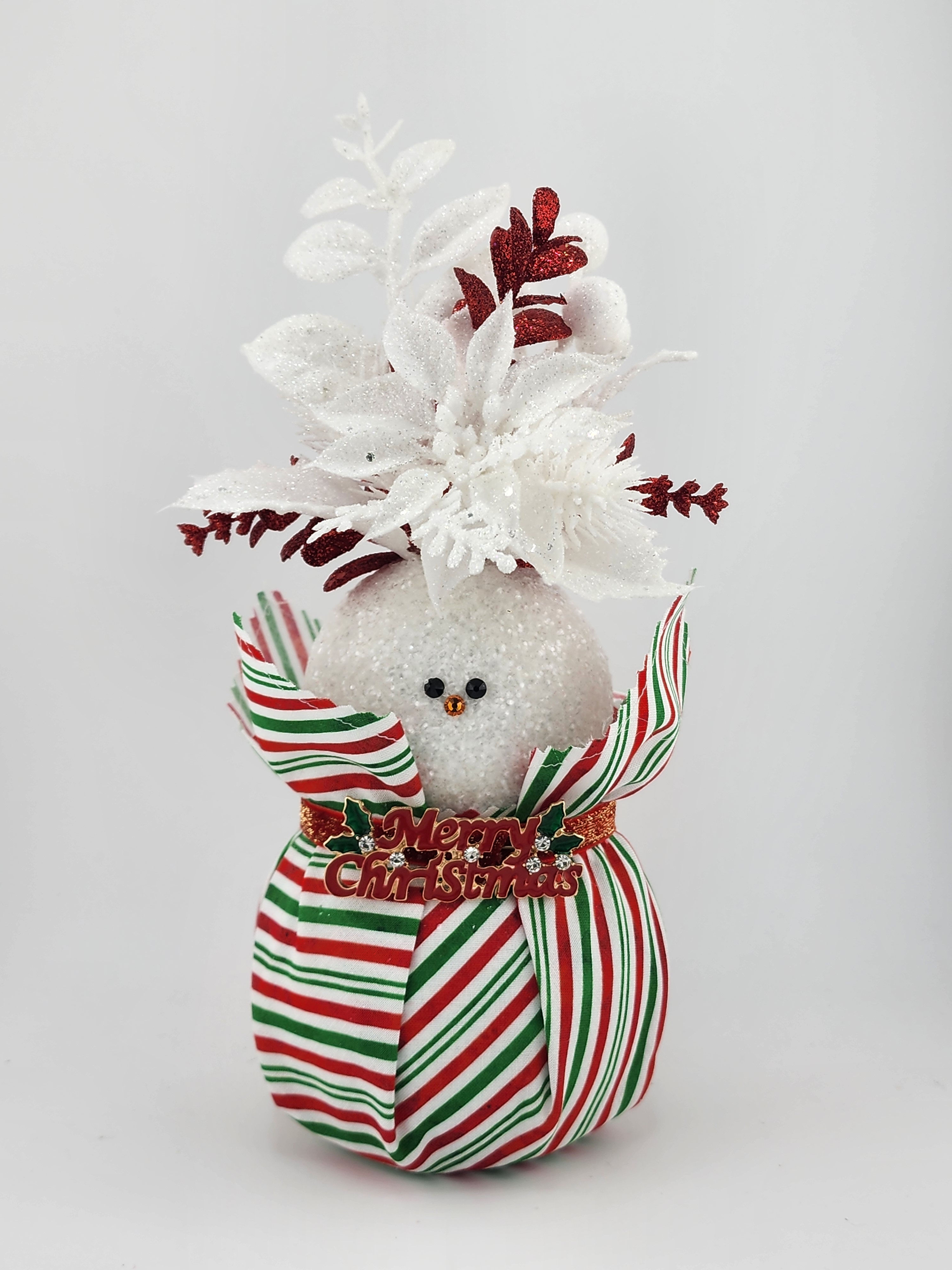 Merry Christmas is a 3d printed glittered snowman, dressed in Christmas florals from Snow Elfyz!
