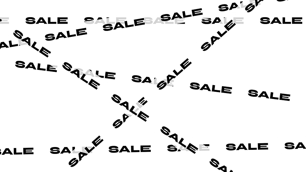 Multiple pieces of tape that say SALE