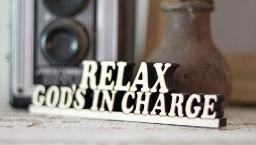 RELAX GOD'S IN CHARGE SIGN