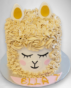 vrolijke kindertaart in lama-thema met fondant krullen, gepersonaliseerd met naam en leeftijd