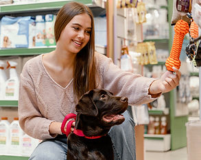 adorable-dog-with-owner-pet-shop.jpg