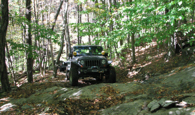 Jeep traversing rocky trail, Long Island Off Road