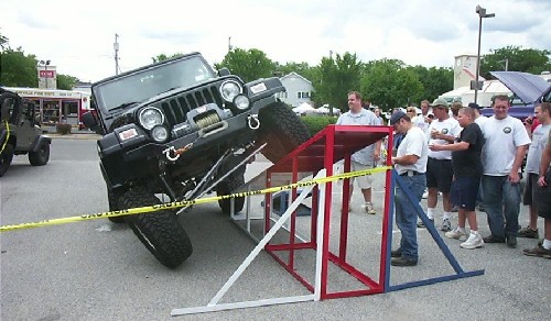 Jeep conquering obstacle course
