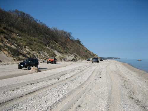 Off-road vehicles on Long Island beach