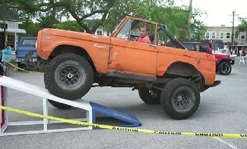 Orange Ford Bronco on ramp, Long Island Off Road