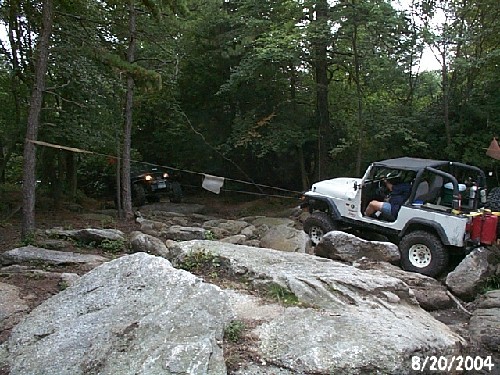 Jeeps navigating rocky terrain