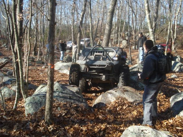 Off-road vehicles navigating rocky terrain