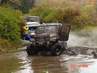 Muddy Jeep in off-road competition