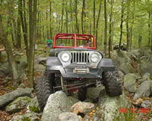 Jeep navigating rocky trail, Long Island Off Road