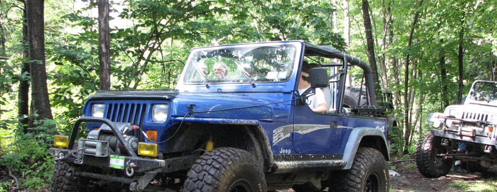 Blue Jeep on trail