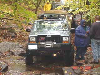 Jeep traversing rocky terrain