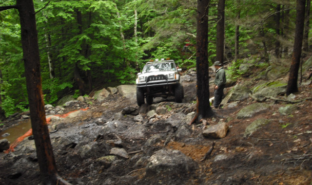 Toyota truck navigating rocky terrain