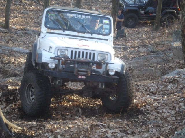 White Jeep Wrangler off-roading