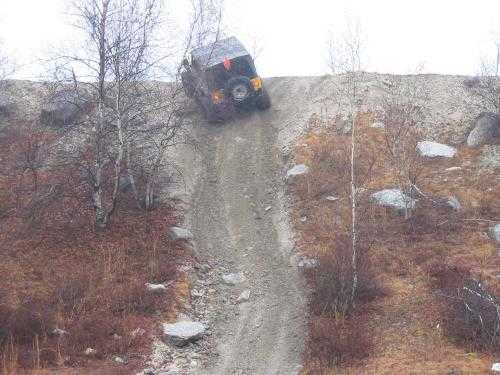 Jeep ascending steep, rocky hill; Long Island Off Road