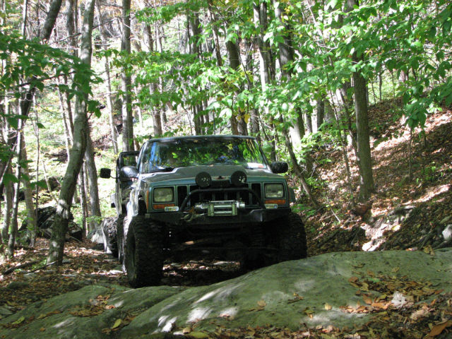 Jeep navigating rocky trail, Long Island Off Road