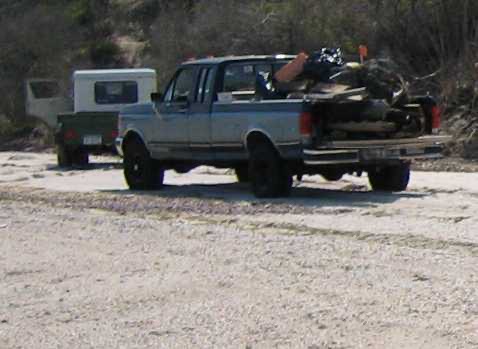 Truck carrying ATV and gear on Long Island Off Road