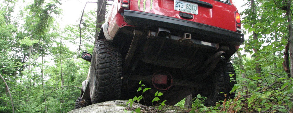 Red Jeep climbing rock, Long Island Off Road