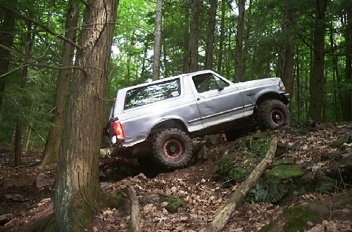 Ford Bronco off-roading on rocky trail