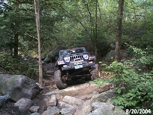 Jeep navigating rocky trail, Long Island Off Road